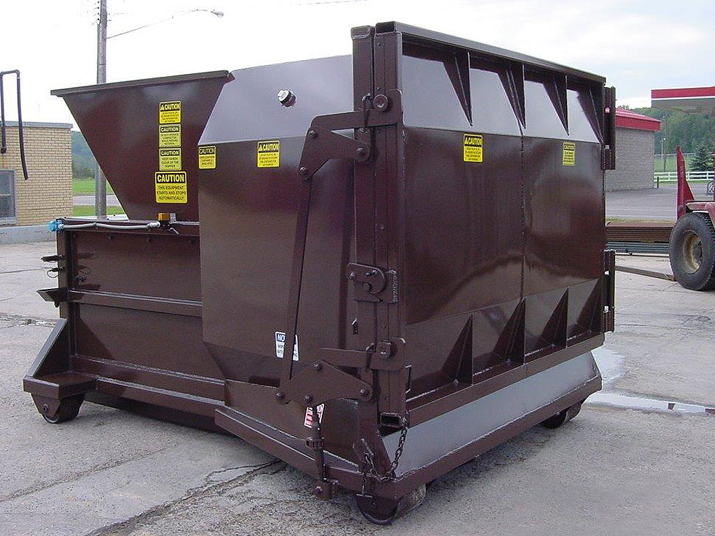 A small compactor for commercial applications requiring self-contained compactors