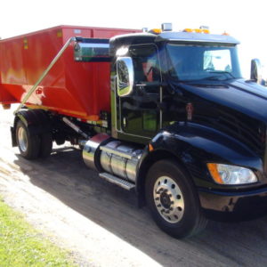 roll off truck with tarping system