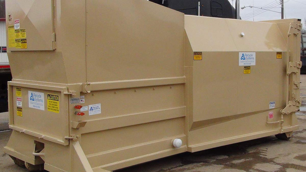 Commercial compactor with marketing decals