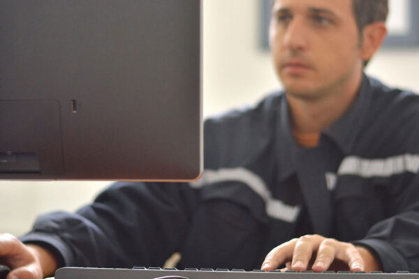 Employee updating a roll off business website