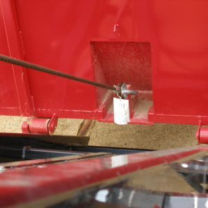 Roll-off cable hoist