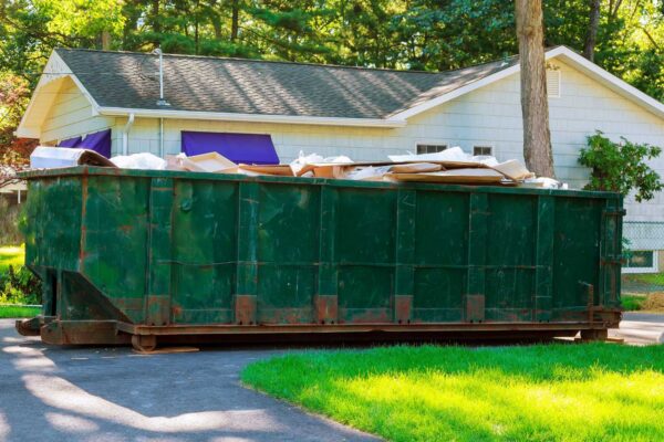 roll-off dumpster placed at a residential home renovation site