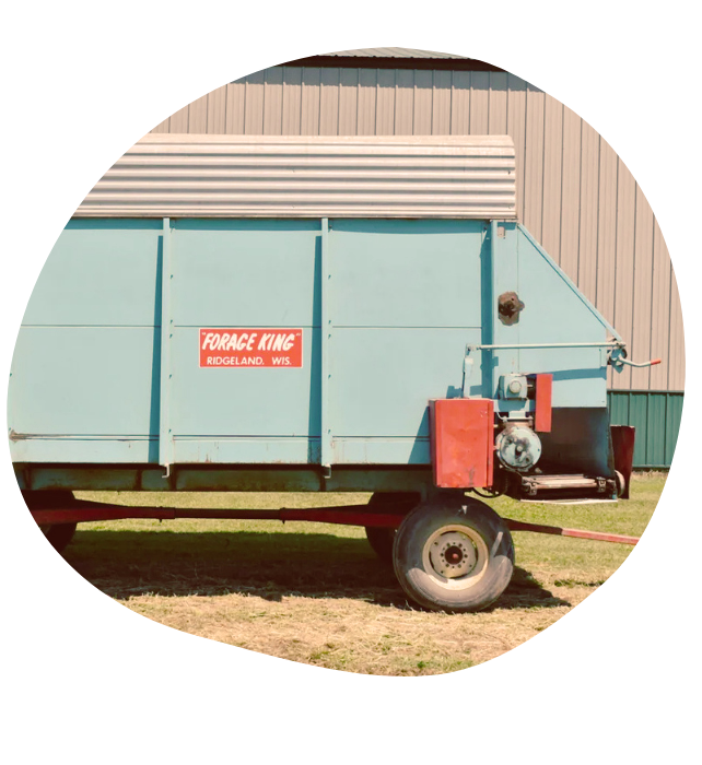 A light blue Forage King trailer built in Ridgeland, WI