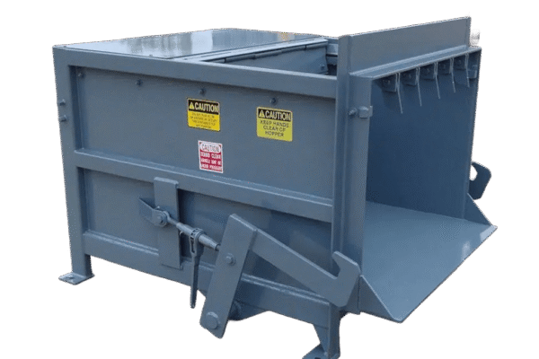A gray Nedland 1 yard stationary compactor