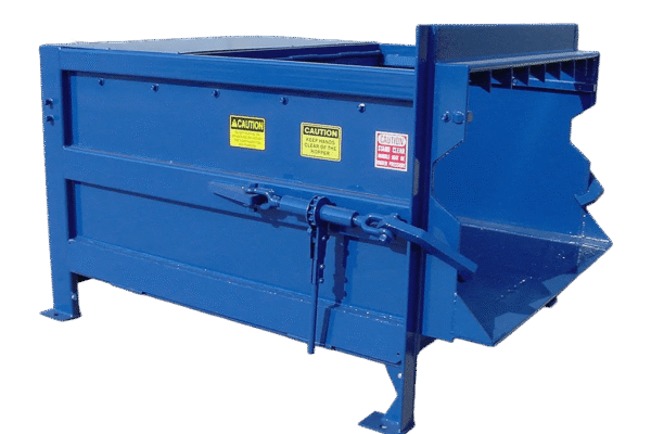 A blue Nedland 2 yard stationary compactor