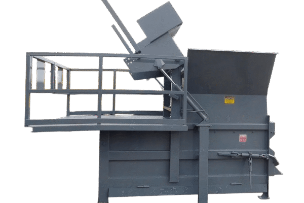 A gray Nedland 3 yard stationary compactor
