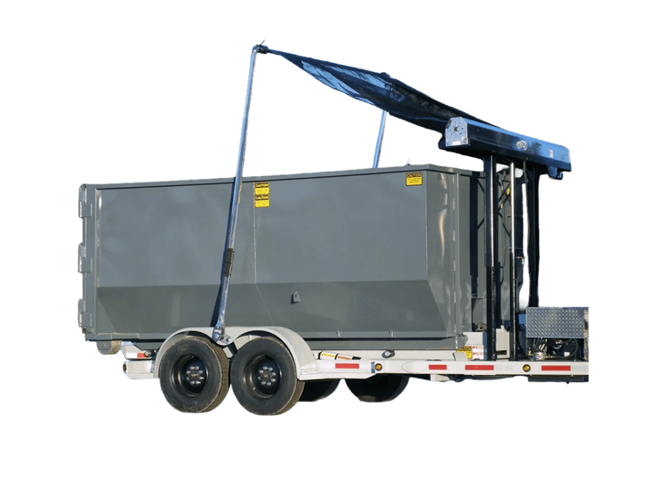 A roll off trailer with a gray dumpster and tarping system